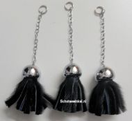 Tassels, Zwart